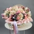 Композиция в корзине "Диодора" из французских роз Квиксенд, диантусов и кустовых пионовидных роз Бомбастик в Апрелевке